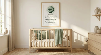 Buddha quote printable wall art displayed above crib in neutral nursery